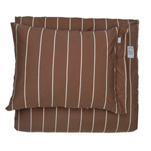 A folded bedding set featuring a brown duvet cover and matching pillowcases with thin beige vertical stripes, shown against a plain white background.