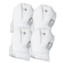 Four white plush bath towels folded in a 2x2 arrangement, each with the Beach House logo on the chest